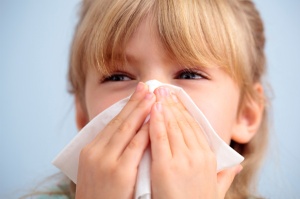 little-girl-sneezing-flu-season